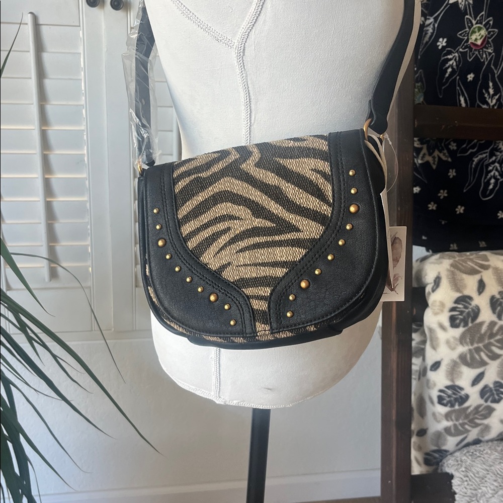 Jessica Simpson’s Stylish Black and Tan Animal Print Women's Bag